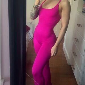 SEAMLESS FLARED PINK STRAPPY BODYSUIT